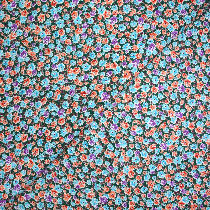 Fleurs bleues/rouges fond vert